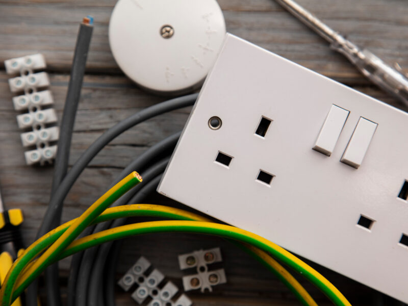 Electrical,Tools,And,Equipment,On,A,Wooden,Background